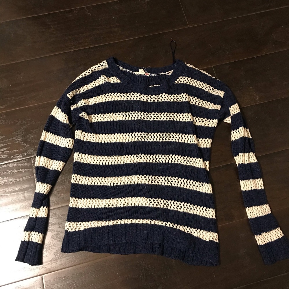 Small navy sweater with buttons down the back